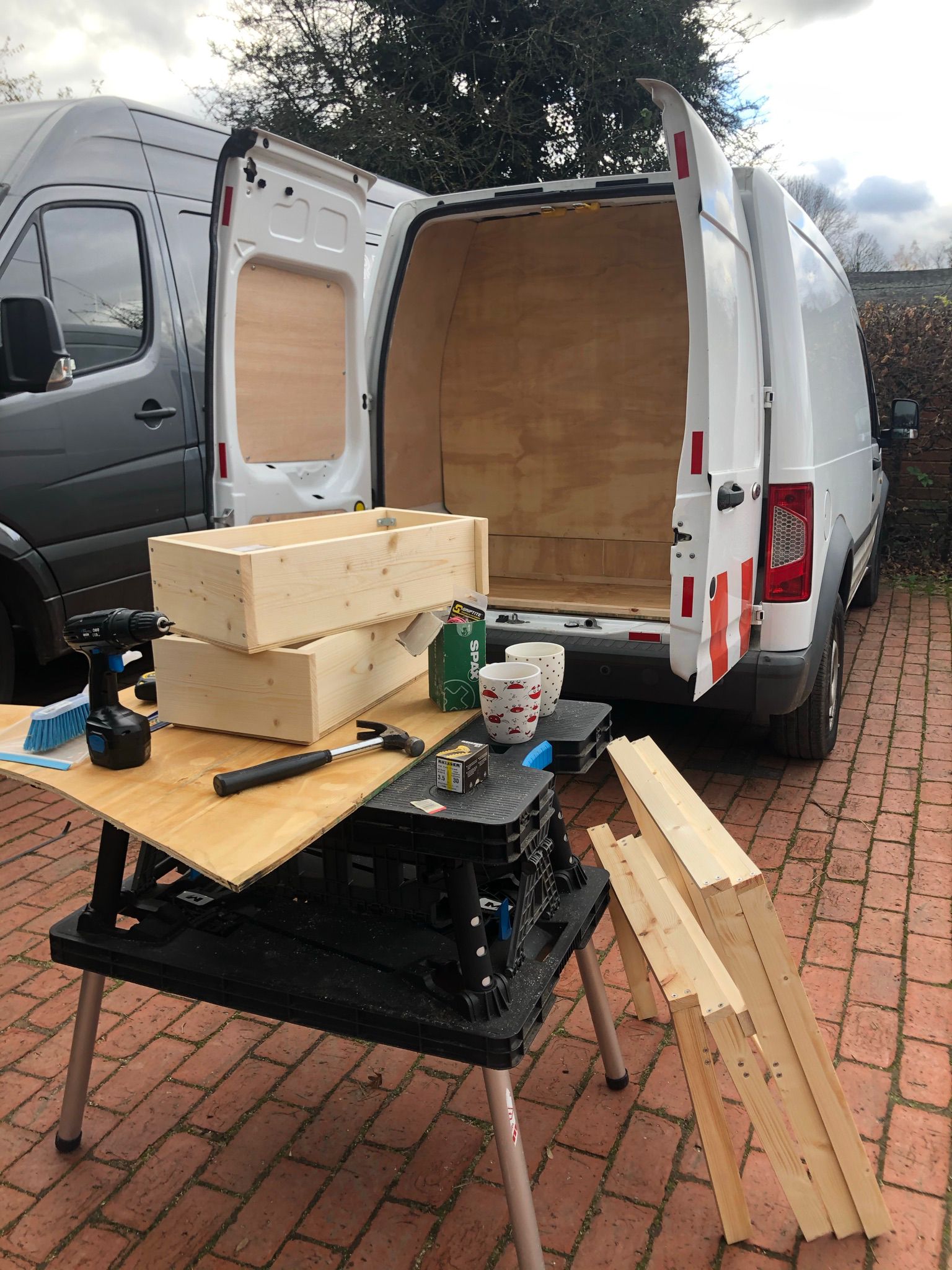 Converting the Ford Connect, with a cup of coffee to keep them going